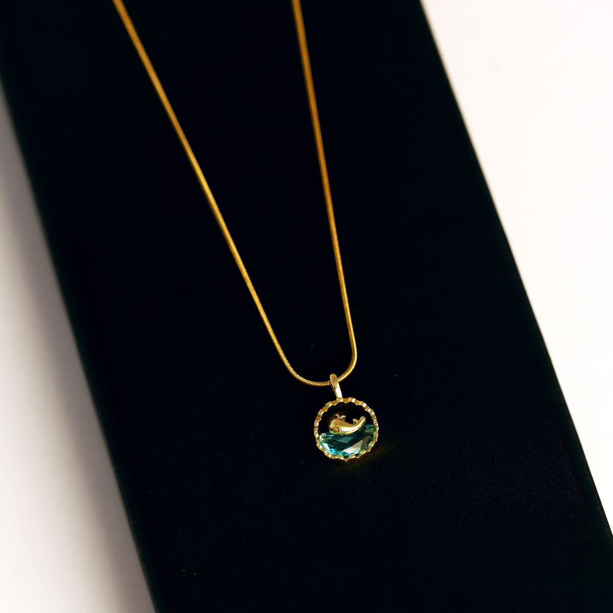 Gold Dolphin and Teal Gemstone Necklace