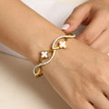 Clover Wave Gold Bangle